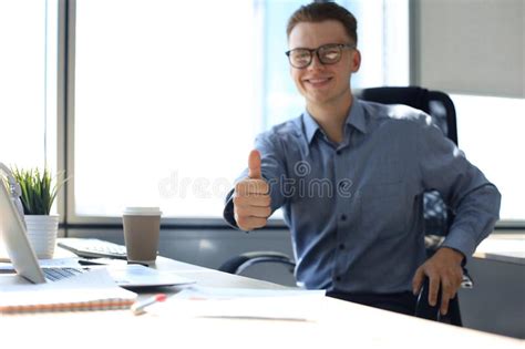 Businessman Showing Thumbs Up in the Office Stock Photo - Image of busy ...