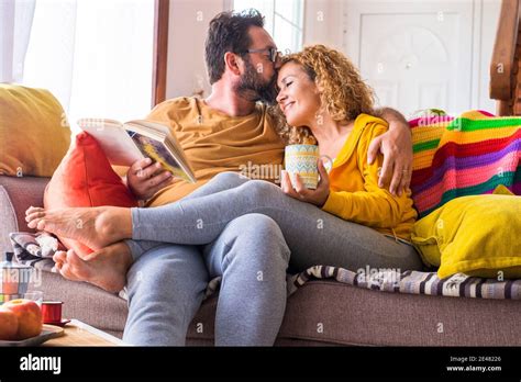 Happy Beautiful Caucasian Couple At Home Enjoy Morning Leisure Activity In Relax Together Love