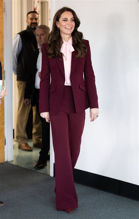 Will and Kate coordinate outfits, as Kate wears sleek plum suit