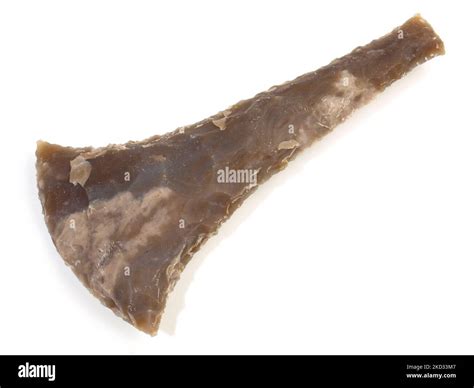 Stone Age Axe Head Out Of Flint Stone On White Background Stock Photo