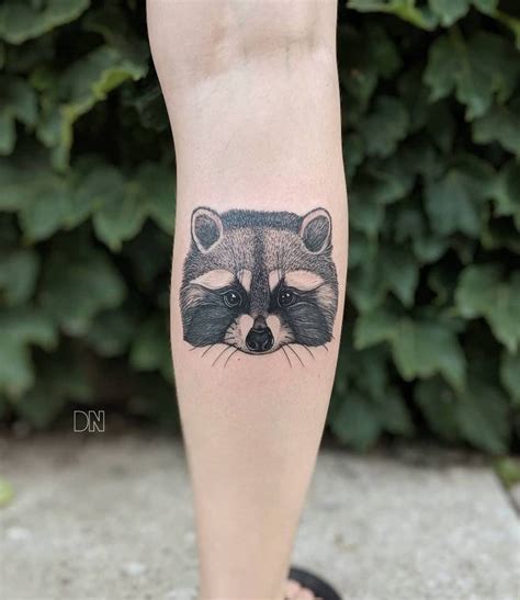 Raccoon Tattoo On The Calf