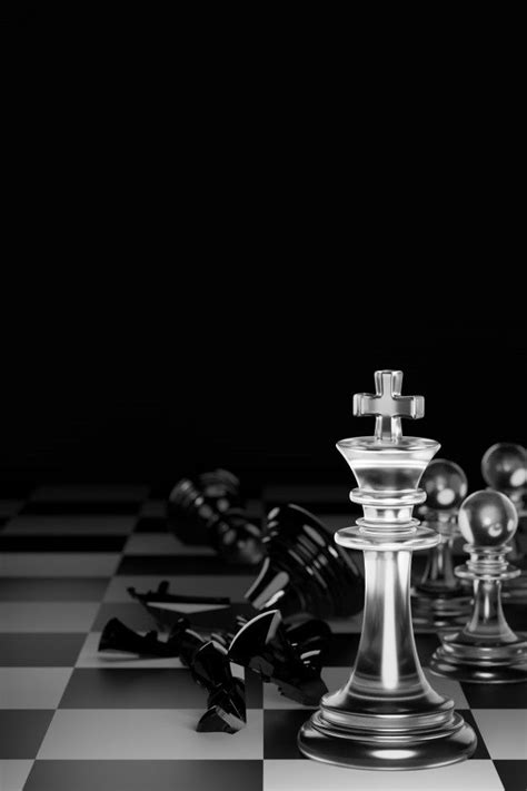 A Black And White Photo Of Chess Pieces