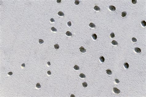 Small Holes On The Surface Of The Sand Summer Background Stock Photo