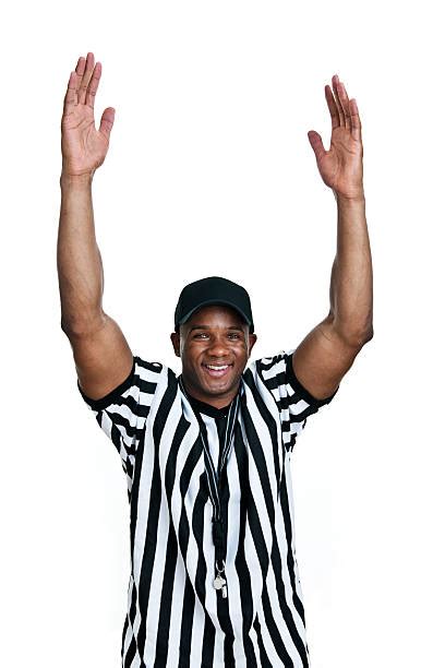 Royalty Free Silhouette Of Football Referee Signaling Touchdown