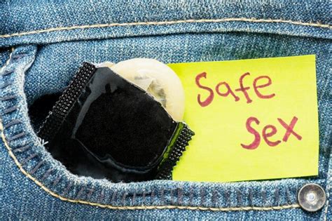 Premium Photo Condom With Safe Sex Text In Pocket Pants