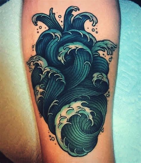 A Tattoo With An Ocean Wave On It