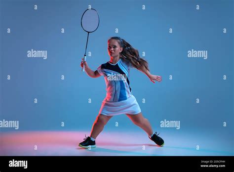 Energy Beautiful Dwarf Woman Practicing In Badminton Isolated On Blue