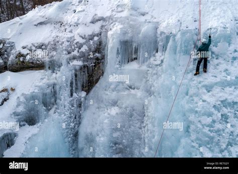 Ice Climbing The North Greece Man Climbing Frozen Waterfall Stock