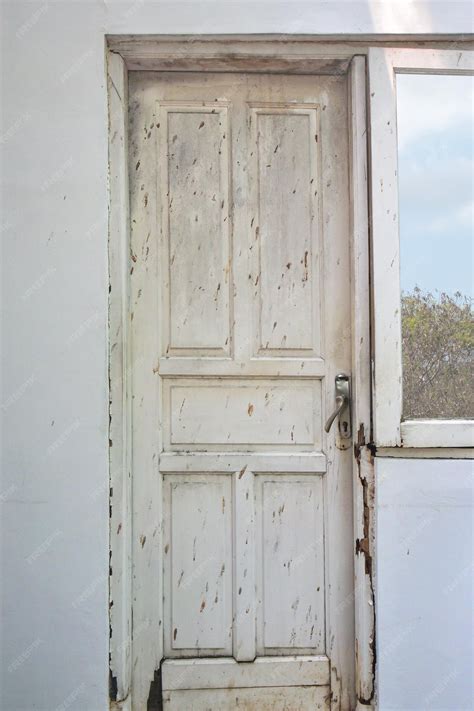 Premium Photo Old White Wooden Door On White Wall Building