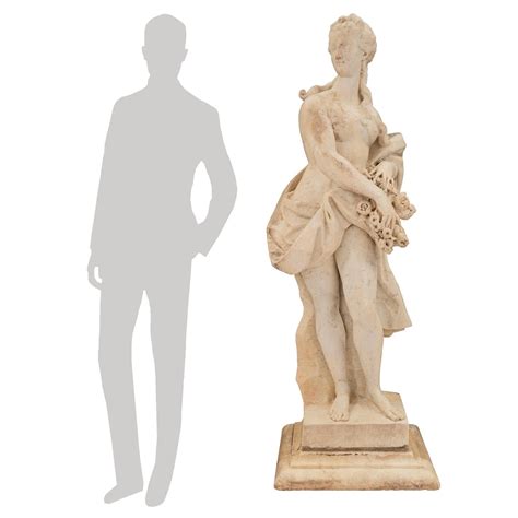 An Italian 17th Century White Carrara Marble Statue Of Daphne Turning Into A Tree Cedric