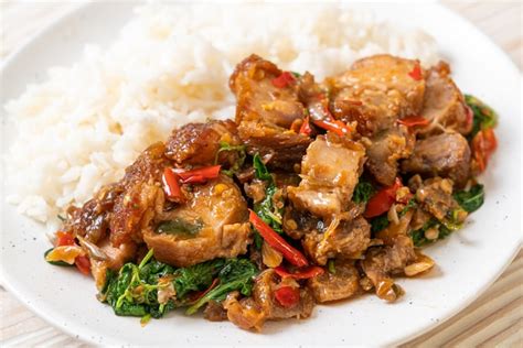 Premium Photo Stir Fried Crispy Pork Belly And Basil With Rice Asian Local Street Food Style