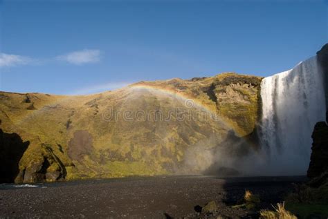 Skogafoss Rainbow Waterfall Stock Photo - Image of nature, hill: 1374074