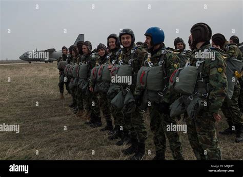 Bulgarian Paratroopers Wait To Load Two Super Hercules C Js And An