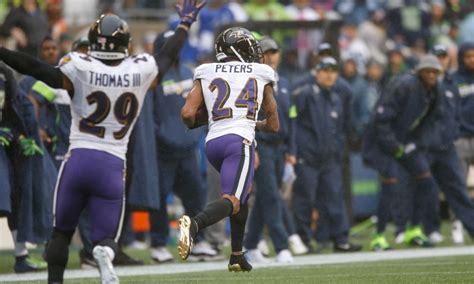 Watch: Marcus Peters builds Ravens lead with pick-six