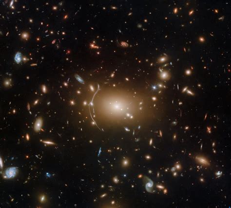 In A New Hubble Image Dark Matter Anchors The Giant Galaxy Cluster