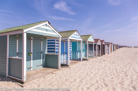 Pastel Stripey Beach Huts At West Wittering Beach West Sussex UK