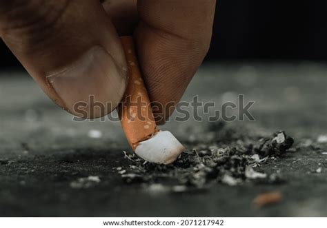 Cigarettehand Putting Out Cigarettetobacco Cigarette Butt Stock Photo