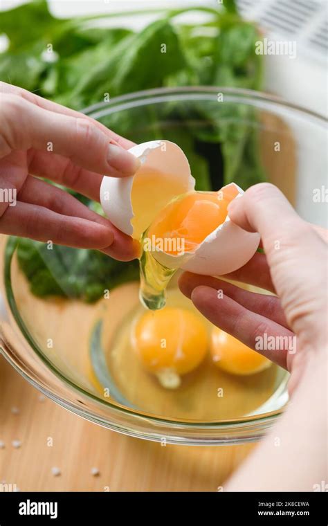 Hands Cracking Egg Hi Res Stock Photography And Images Alamy