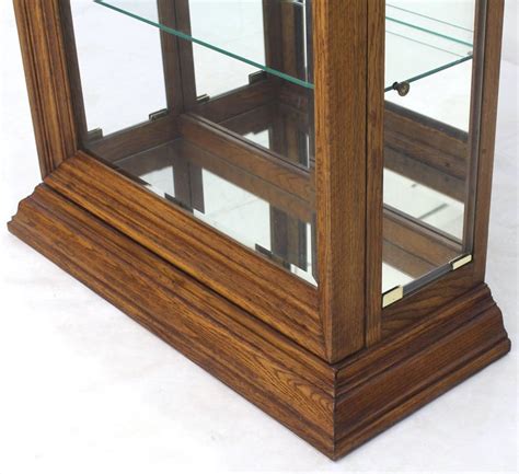 Tall Narrow Side Doors Beveled Glass Oak Curio Display Cabinet At 1stdibs Curio Cabinet With