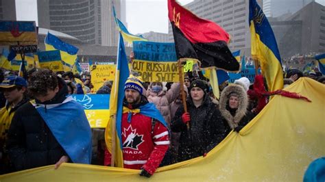 Why is the red and black flag, seen at rallies in support of Ukraine ...