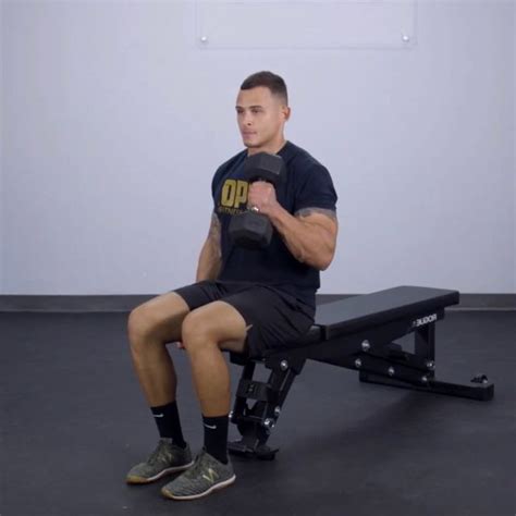 Seated One Arm Hammer Curl L By Ömer Köseoğlu Exercise How To Skimble