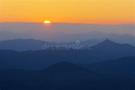 Mountain Silhouettes At Sunset Stock Photo Image Of Layers Group