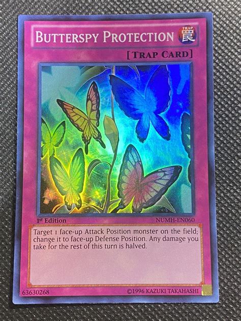 YuGiOh Butterspy Protection NUMH EN060 Super Rare 1st Edition Near