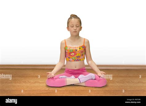 Girl Practices Yoga Stock Photo Alamy