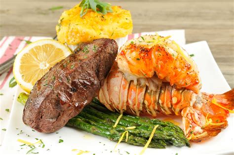 Summer Celebration Special Surf And Turf With Steak Lobster Tail Twice Baked Potatoes And