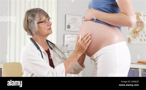 Doctor Checking Pregnant Woman S Belly Stock Video Footage Alamy