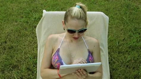 Sexy Woman In Bikini With A Tablet On A Stock Video Pond
