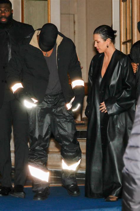 Bianca Censori Covers Up In Black Trench Coat As Kanye West Dons Black