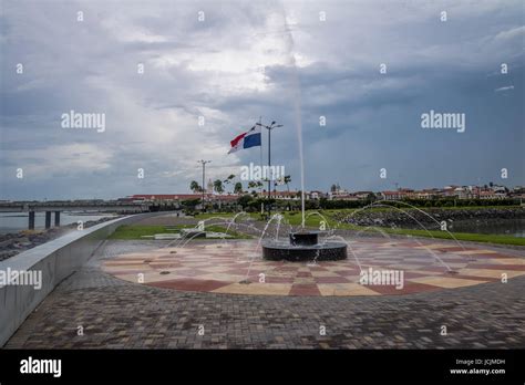 Fountain In Panama City With Country Flag And Casco Viejo Old City On