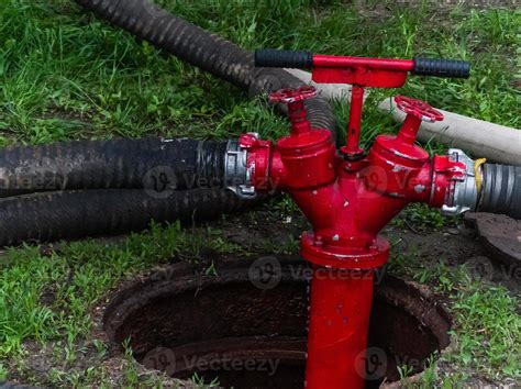 Fire Hydrant In Use During A Structure Fire 16479504 Stock Photo At