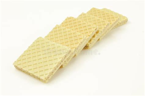 Stack Of Thin Vanilla Filled Wafer Biscuits Isolated On White