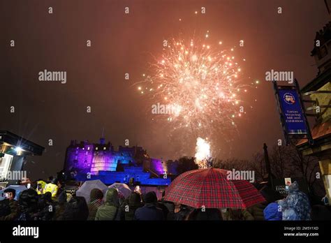 Revellers watch fireworks at Edinburgh Castle during the Hogmanay New ...