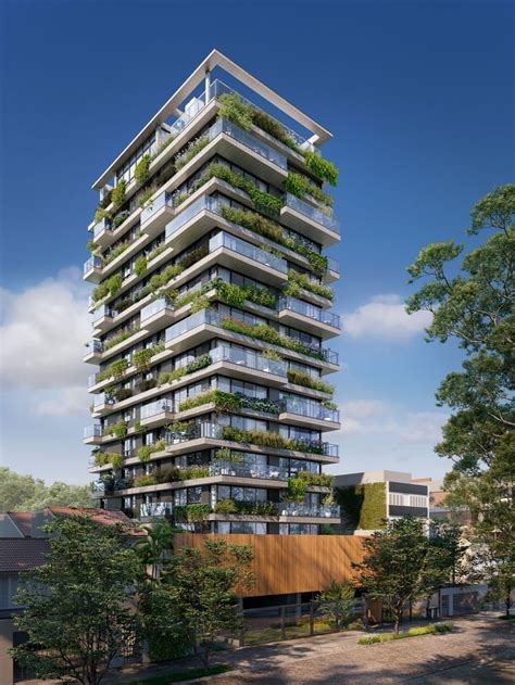 A Tall Building With Plants Growing On It