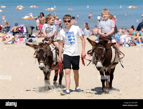 Donkey Rides On Weymouth Beach Children Enjoy A Donkey Ride Dorset