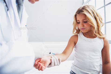 Little Girl And Pediatrician Stock Photo By Georgerudy Photodune