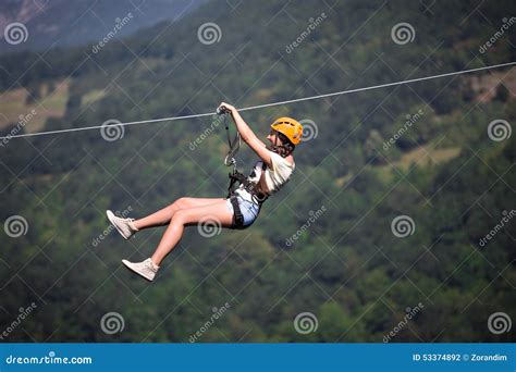 Adult woman on zip line stock photo. Image of farmhouse - 53374892