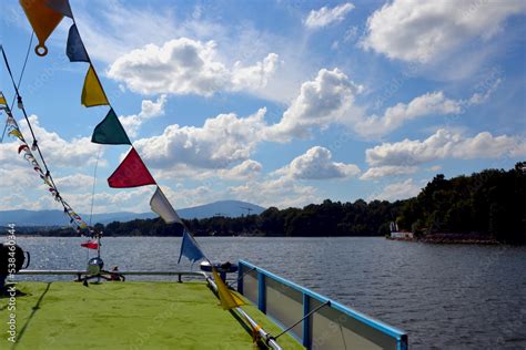 Colorful flags on the cruise ship, flags on the sailing ship's backing. Zywiec Lake (Polish ...