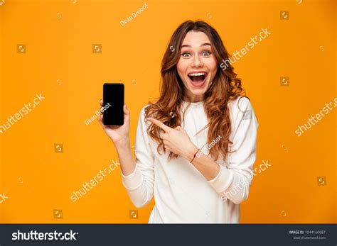 Surprised Happy Brunette Woman Sweater Showing Stock Photo 1044160687
