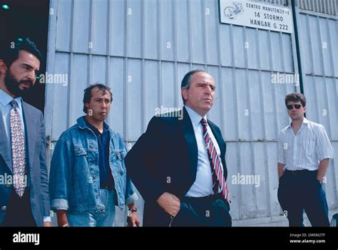 Italian Magistrate Rosario Priore Outside The Hangar With The Rest Of