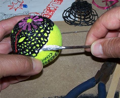 3D pen ideas: Using a 3-D pen with a tennis ball used as a form