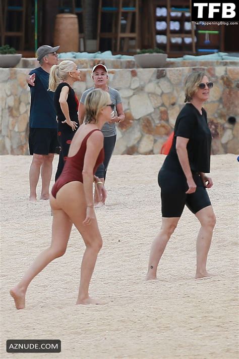 Charlize Theron Sets Pulses Racing In A Red Hot One Piece Swimsuit Aznude