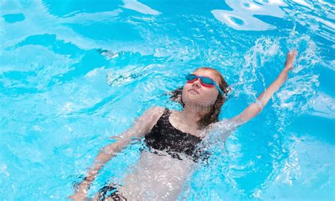 girl swimming   crawl style stock photo image  active