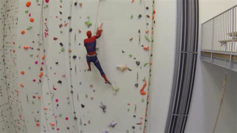 Man Dressed Like Spider Man Speed Climbs Wall Faster Than The Real Spider Man