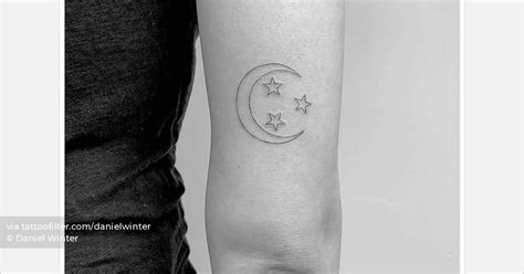 Fine Line Moon And Stars Tattoo Located On The Tricep