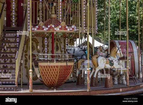 Old Fashioned Merry Go Round Lite Up With No One Onboard Stock Photo