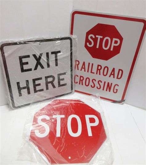 Signs Include Stop Sign Stop Railroad Crossing And Exit Here